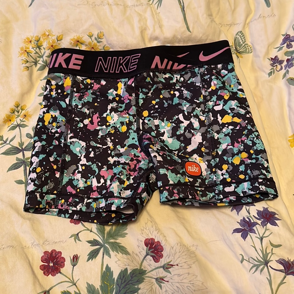 Girls size small colorful Nike pro shorts.